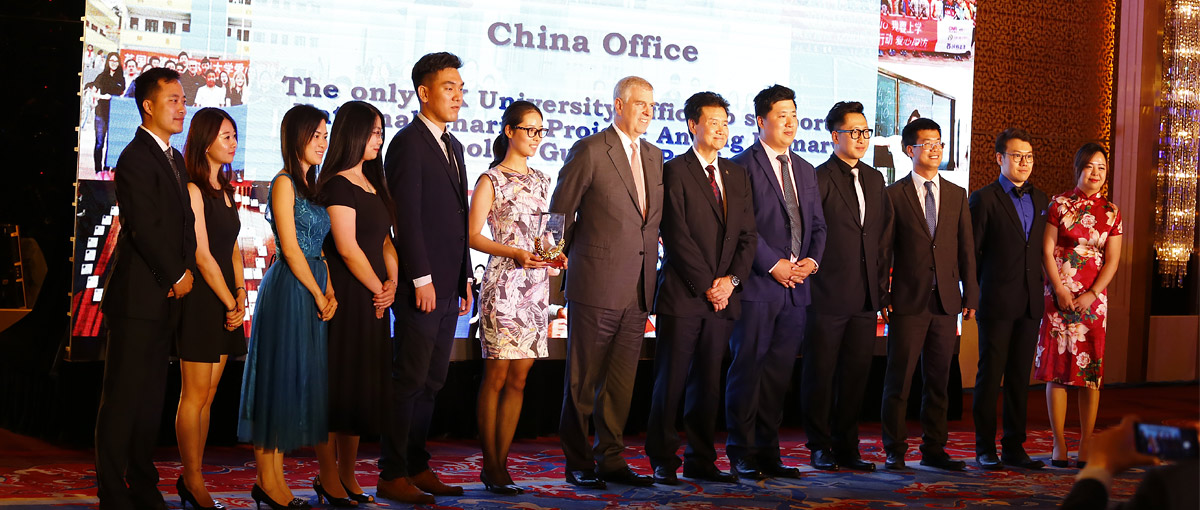 The Chancellor is pictured with the University's representatives from the China office in Beijing