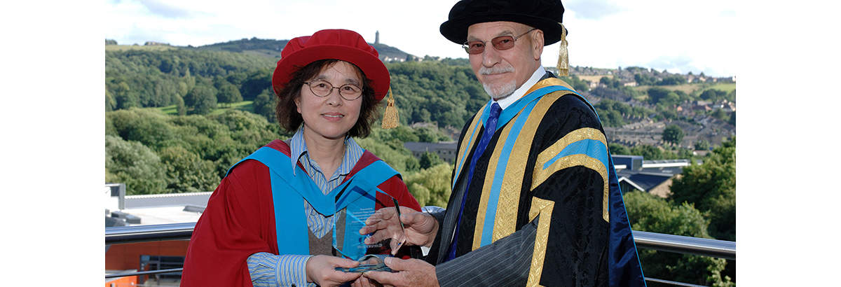 Professor Jane Jiang pictured with the University's former Chancellor Sir Patrick Stewart