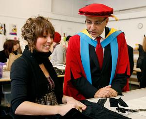 Theo Paphitis with textile student
