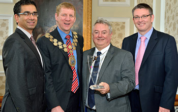 University of the Year Award Civic Reception hosted by the Mayor of Kirklees at Huddersfield Town Hall - Pictured are (l-r) Leader of the Council Cllr Mehboob Khan, Mayor of Kirklees Cllr Martyn Bolt, the University's Vice-Chancellor Professor Bob Cryan and the Chief Executive of Kirklees Council Adrian Lythgo.  
