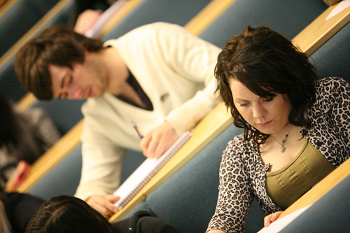Male and Female student in lecture