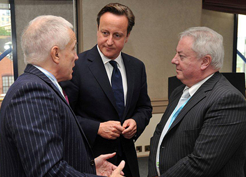 Entrepreneur Alan Lewis (left) with the University of Huddersfield's Vice-Chancellor Professor Bob Cryan (right) discusses the 3M Buckley Innovation Centre with Prime Minister David Cameron.