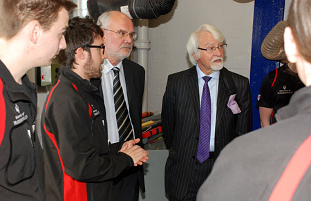Professor Unsworth is shown around Team HARE's workshop
