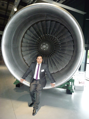 Aftab Azal in front of the Rolls Royce jet engine RB211 22B