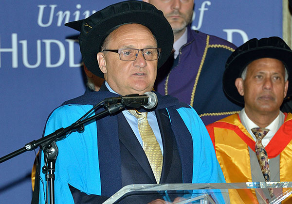 Philip Darnell speaks after receiving his honorary doctorate