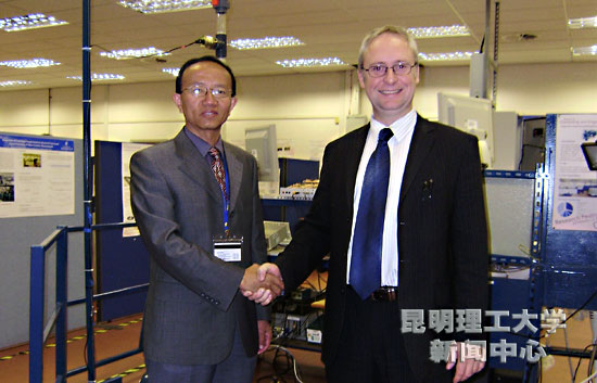 Professor Andrew Ball and Professor Xiaocong He 