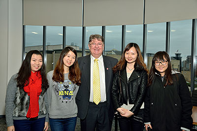 Professor Ian Gow OBE with students of the Sino British College