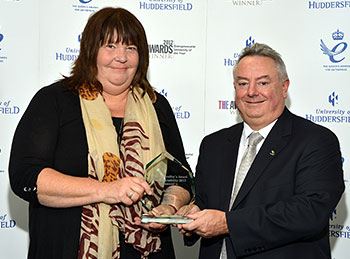 Julia Meaton receives award from Professor Bob Cryan at the Vice-Chancellor's award for sustainability