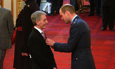 Colin Blair receiving OBE from the Duke of Cambridge