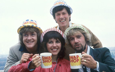 The young Maggie Philbin is pictured with the original Swap Shop line-up (l-r) Keith Chegwin, John Craven and Noel Edmonds 