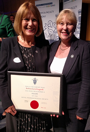 Lynn Haygarth (left) is pictured with Huddersfield lecturer and Past President of the Royal Pharmaceutical Society of Great Britain, Dr Gillian Hawkesworth MBE, after receiving her Fellowship