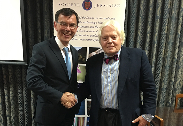 Huddersfield's Professor Tim Thornton is welcomed by Richard Falle, Advocate and Consultant to Jersey Law Firm Bois Bois Lawyers