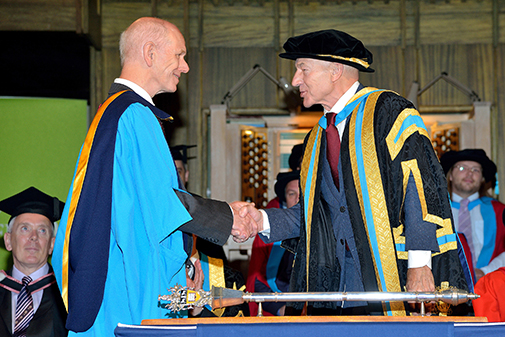 Sir John O’Reilly (left) is pictured receiving his honorary award from the University’s Emeritus Chancellor, Sir Patrick Stewart.
