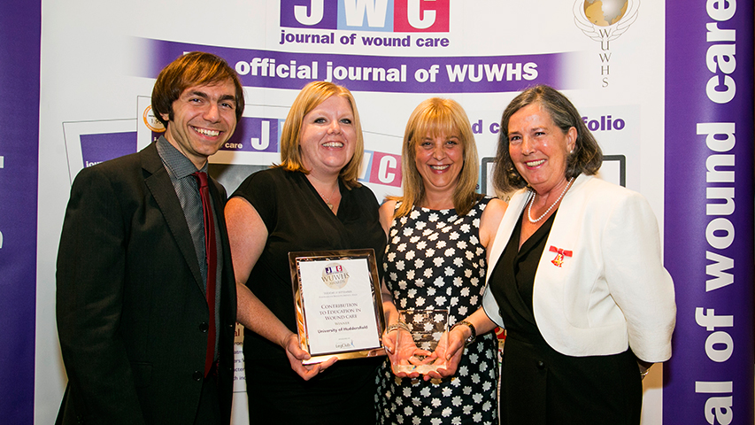 Huddersfield's Amit Gefen, Leanne Atkin and Karen Ousey with the Societies's Chairperson