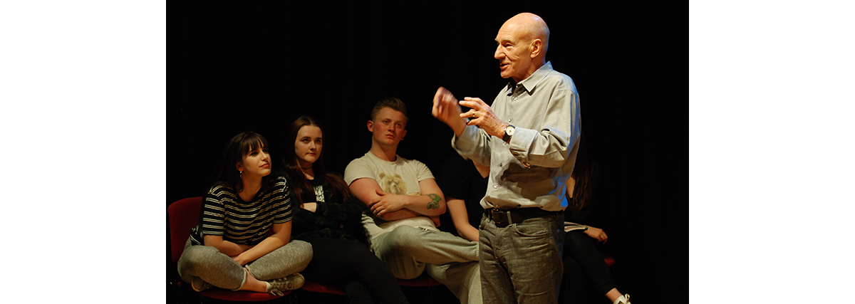 Sir Patrick Stewart with the drama students in acting masterlass