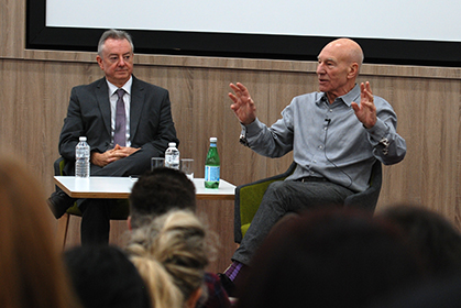 Sir Patrick Stewart right with Professor Bob Cryan in a Q & A session with students