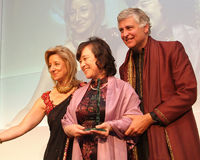 Jane winning the Asian Women of Achievement Award in 2006